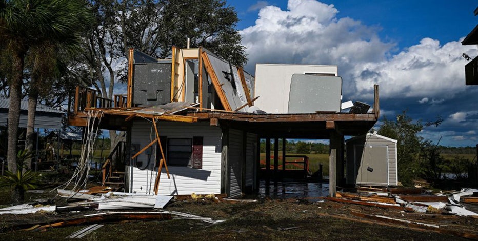 Idalia digs inland as tropical storm, immersing Southeast in floodwaters following historic Florida landfall