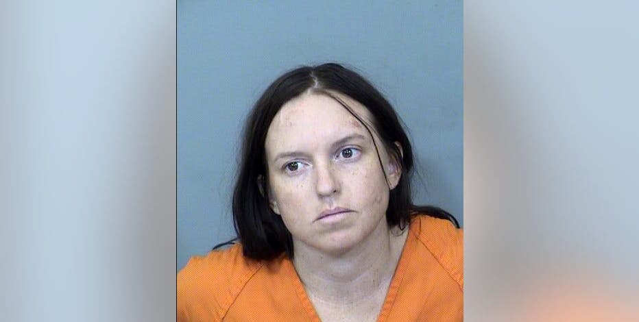 Woman arrested after dog attacked Phoenix officers: PD