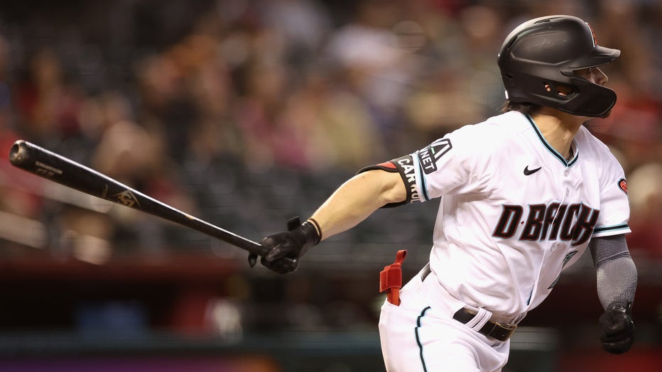 Corbin Carroll #7 of the Arizona Diamondbacks hits a sacrifice fly against the Colorado Rockies during the fourth inning of the MLB game at Chase Field on September 5, 2023. (Photo by Christian Petersen/Getty Images)