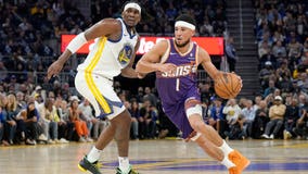 Booker, Durant lead Suns past Curry and Warriors 108-104 in season opener