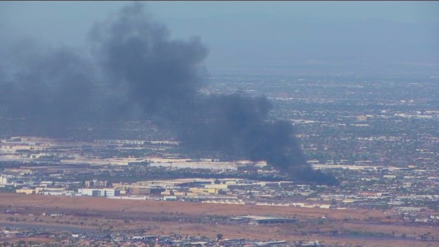 Phoenix trailer fire leaves 10 displaced, sends pillar of smoke into air