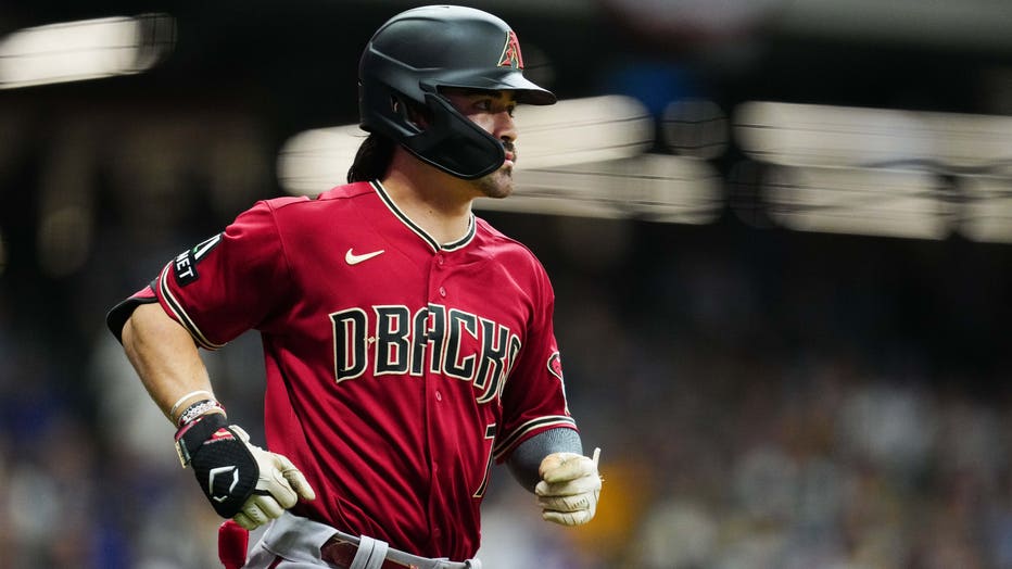 Diamondbacks get to Burnes, rally past Brewers