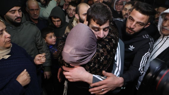 Hamas frees 12 more hostages from Gaza as fragile truce with Israel holds