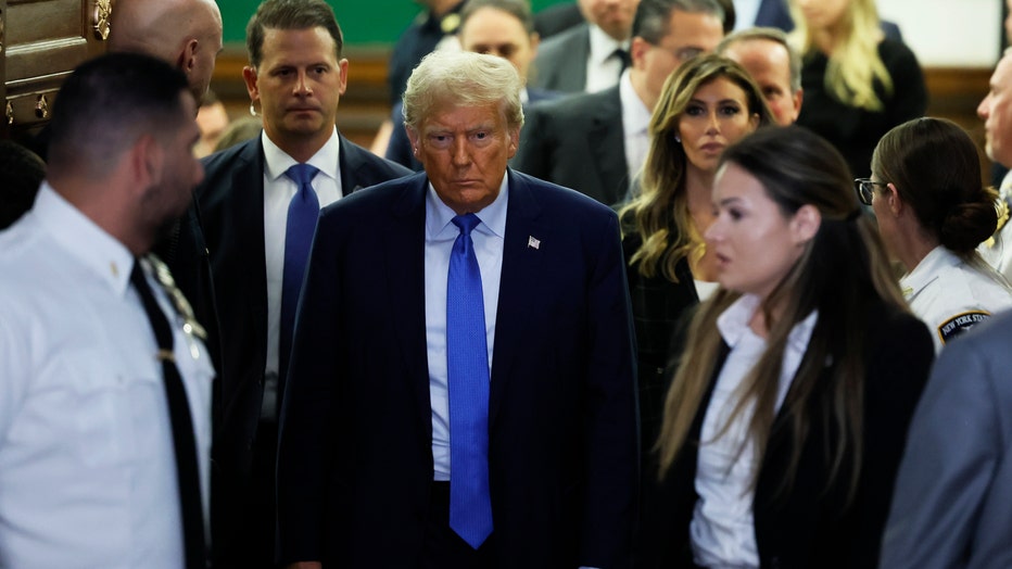 Former President Donald Trump exits the courtroom after testifying at his civil fraud trial at New York State Supreme Court on November 06, 2023 in New York City. (Photo by Michael M. Santiago/Getty Images)