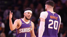 Booker scores 32, Suns hang on late to beat Warriors 119-116; Draymond Green ejected