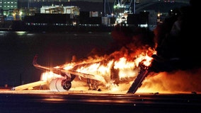 Japan Airlines plane catches fire after collision at Tokyo’s Haneda airport, leaving 5 dead