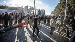 Iran says at least 95 killed in blasts at ceremony honoring slain general
