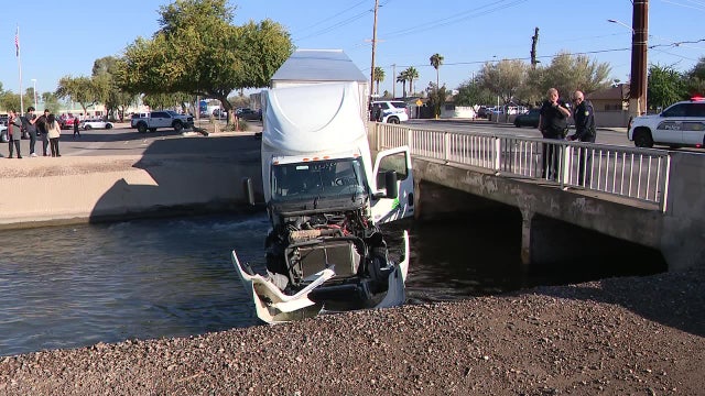 Driver speaks after crash sends semi truck into Phoenix canal