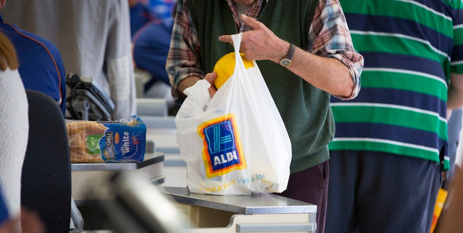 Aldi Supermarket new green compostable carrier bag isolated on a white  background Stock Photo - Alamy