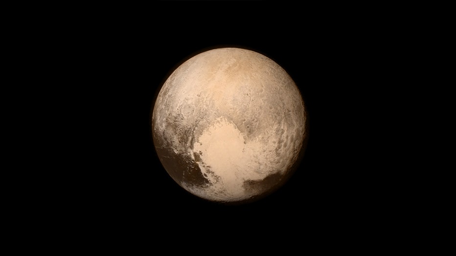 Pluto, as seen in a photo taken by the New Horizons spacecraft. (Photo by NASA/APL/SwRI via Getty Images)