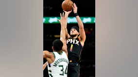 Booker scores 32, Durant adds 28, Suns push past short-handed Bucks 114-106