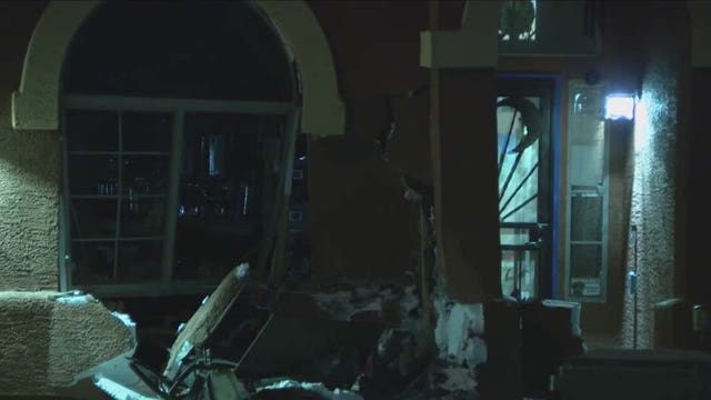 Driver dies after crashing into Mesa home
