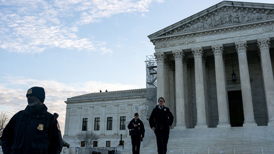Law enforcement officers outside the US Supreme Court in Washington, DC, US, on Thursday, Feb. 8, 2024. Photographer: Nathan Howard/Bloomberg via Getty Images