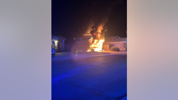 Hybrid car catches fire in Surprise home's garage