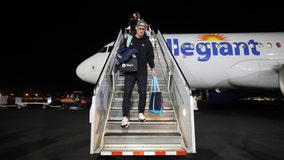 After flight delay, defending champion UConn arrives in Arizona for Final Four in middle of night