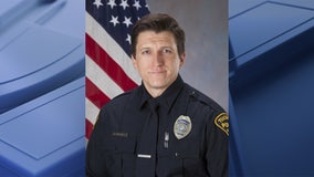 Man charged with causing car crash that killed Tucson Police Officer Adam Buckner