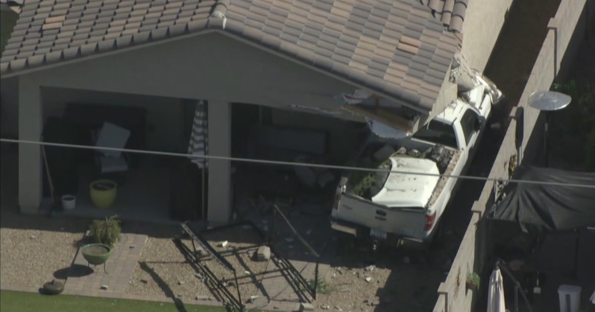 Truck crashes into Phoenix home, possibly causing structure damage ...