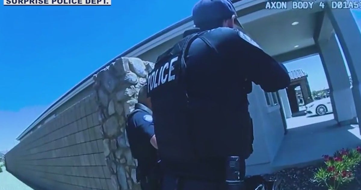 Body cam shows Surprise Police go into barricaded home to rescue baby ...