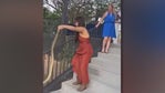 Woman wrangles loose snake at Arizona wedding