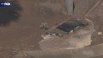 Car sinks into mud near Desert Sky Mall in Phoenix