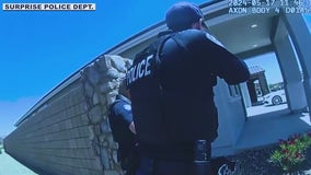 Body cam shows Surprise Police go into barricaded home to rescue baby who'd been shot