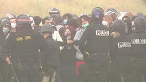 Tense standoff at UC Santa Cruz as police arrest protesters blocking campus