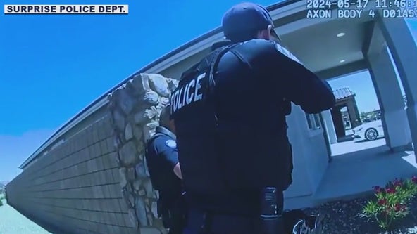 Body cam shows Surprise Police go into barricaded home to rescue baby who'd been shot