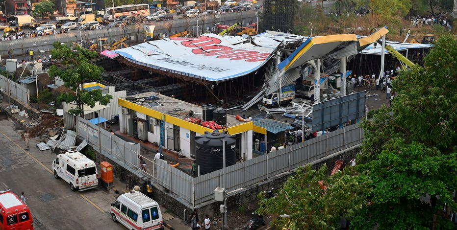 Billboard collapses onto group of pedestrians, killing at least 14