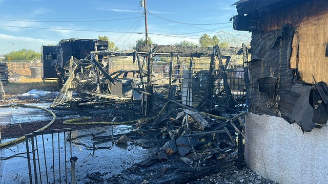 Person burned trying to stop fire from spreading at Phoenix home