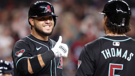 Eugenio Suarez homers, Diamondbacks rally past Braves