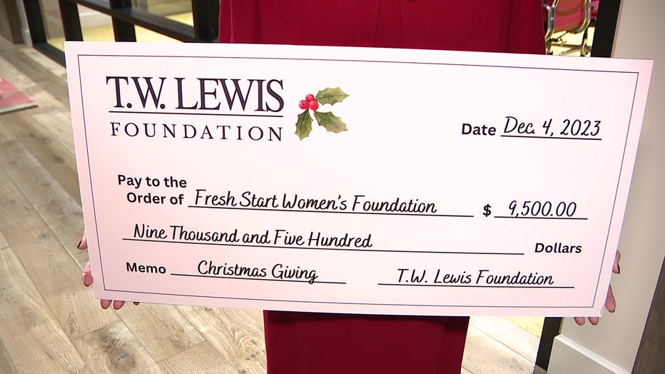 A big printout of a check, as used in a check presentation ceremony (From Archive)