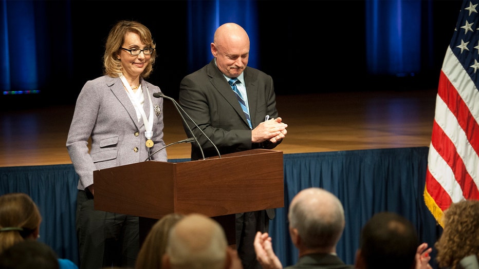 Former Arizona Congresswoman Gabby Giffords (left) and Mark Kelly (right), in a photo taken in 2013. (U.S. Army photo by Staff Sgt. Bernardo Fuller)