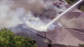 Several firefighters injured after burning home's roof collapsed in Mesa