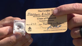 Arizona father and son finds 2 carat diamond while digging at Arkansas state park