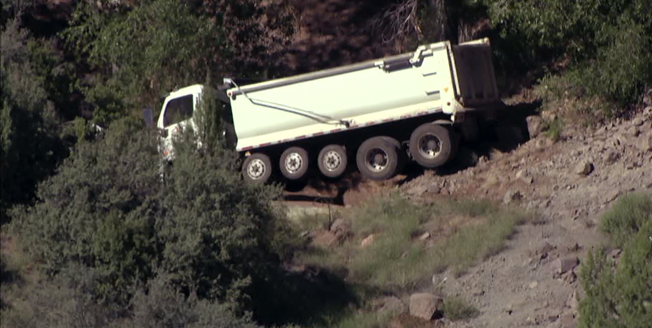 Dump truck goes over embankment in Yavapai County