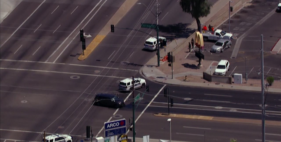 1 dead, another hurt in Phoenix crash that sent a car flying into pedestrians, PD says