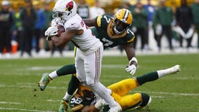 Doubs catches 2 TD passes in his return from a suspension to help Packers rout Cardinals 34-13