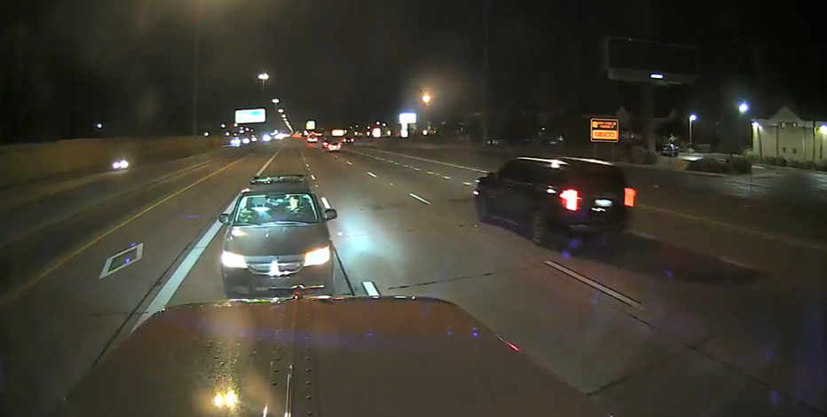 Tow truck dashcam captures truck driver stopping a wrong-way car