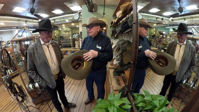 Maricopa County Sheriff Jerry Sheridan gets fitted for custom cowboy hat