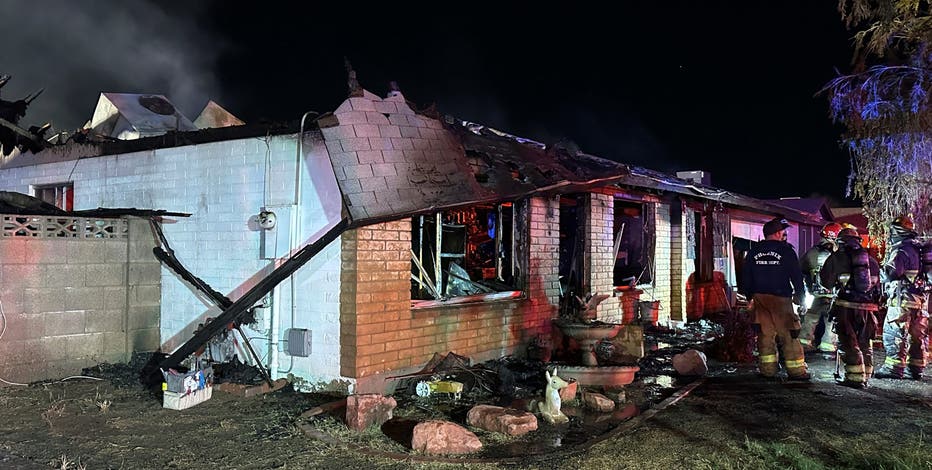 Woman found dead in west Phoenix double house fire