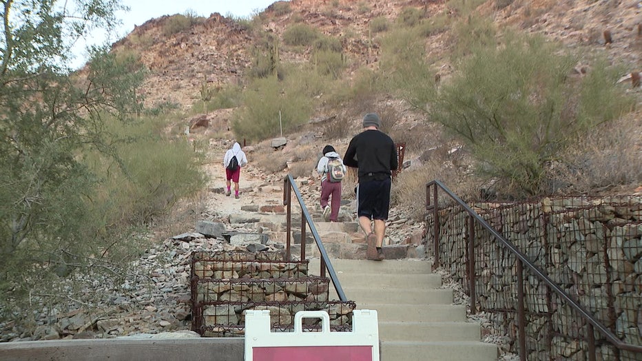 Hikers along a trail in the Piestewa Peak area. Piestewa Peak was once known as "Squaw Peak."