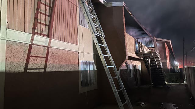 Woman burned in Phoenix apartment fire, 8 people displaced