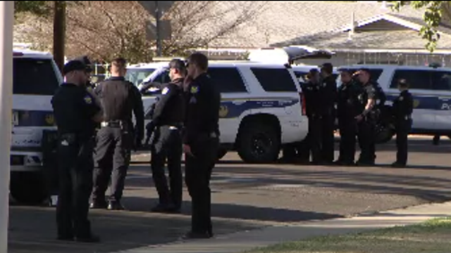 Man found dead and woman shot as police swarm a house in Phoenix with a drone for investigation