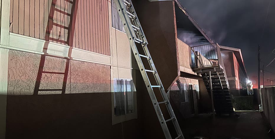 Woman burned in Phoenix apartment fire, 8 people displaced