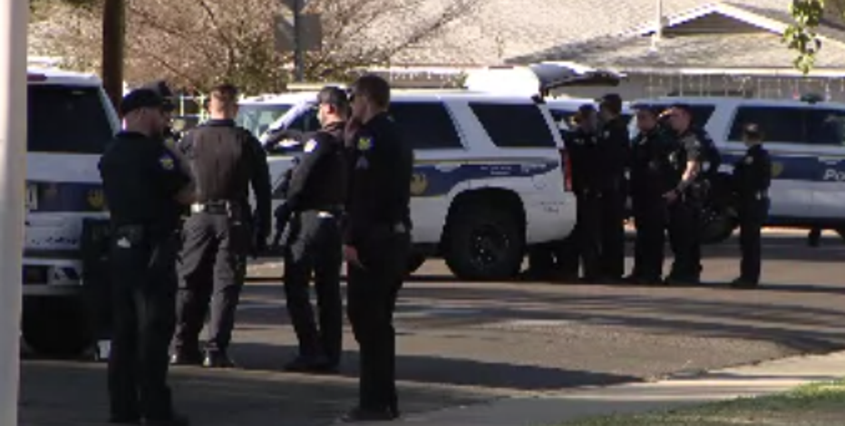 Man found dead and woman shot as police swarm a house in Phoenix with a drone for investigation