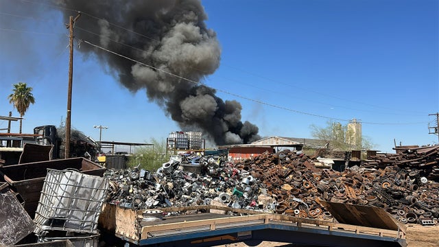 Scrapyard fire burns in Phoenix