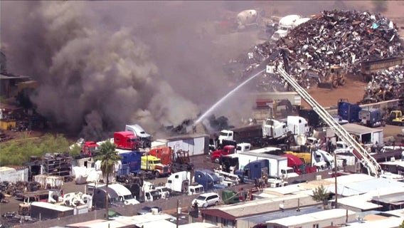 Crews battle scrapyard fire in south Phoenix