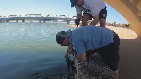 Brothers bond over magnet fishing in Tempe Town Lake