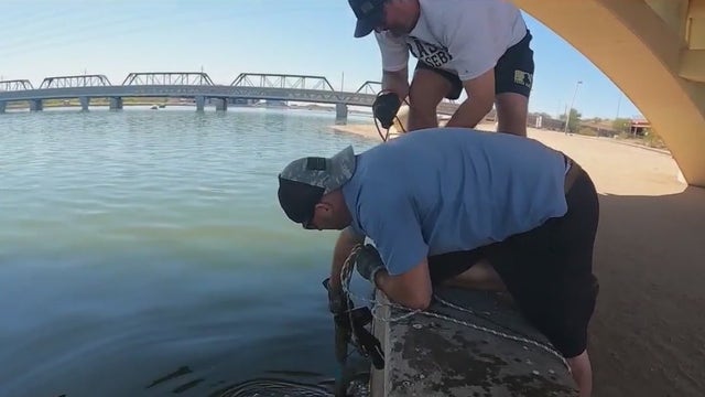 Brothers bond over magnet fishing in Tempe Town Lake
