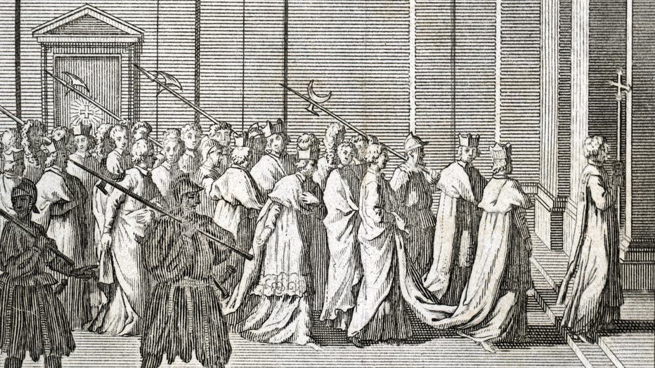 A drawing shows the entrance of the cardinals in the Sistine chapel for a papal conclave (Photo by Bridgeman via Getty Images)